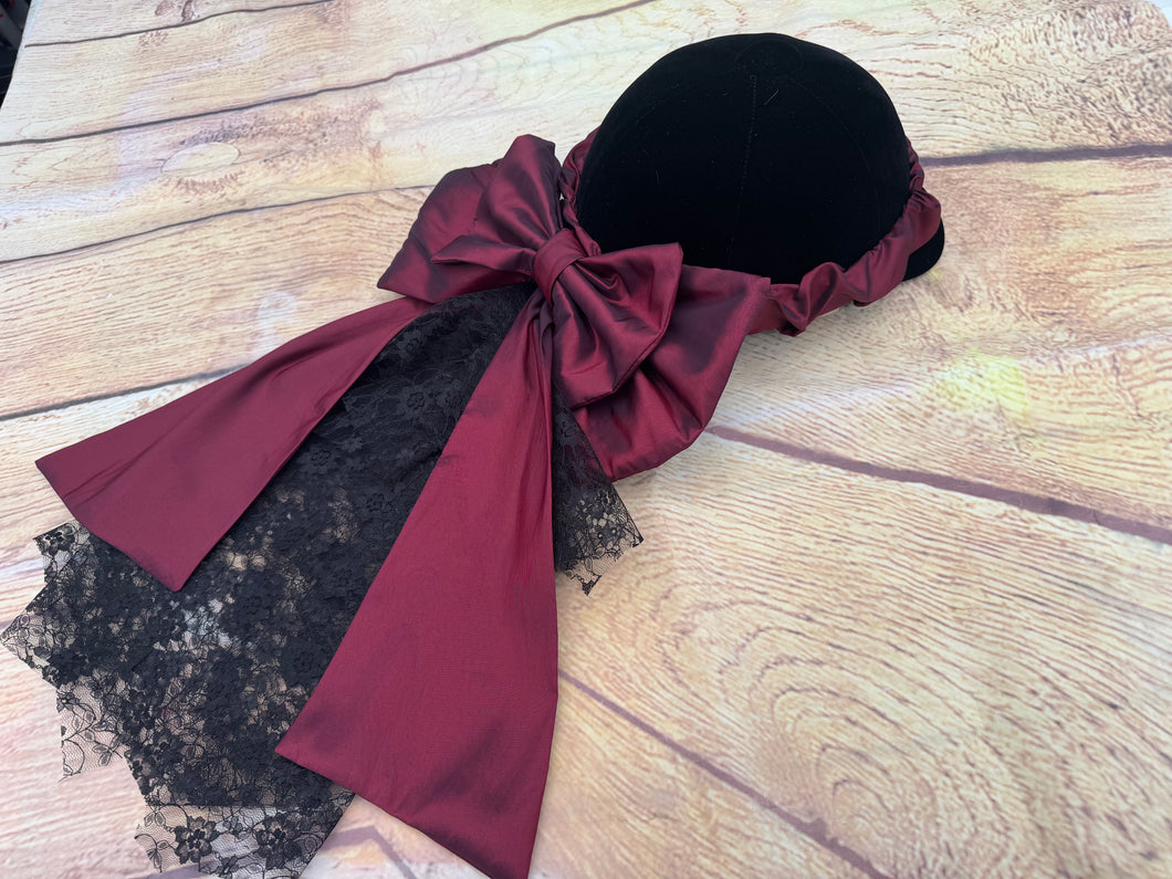 Burgundy taffeta and lace  on an elasticated band.