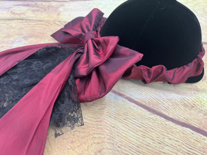 Burgundy taffeta and lace  on an elasticated band.