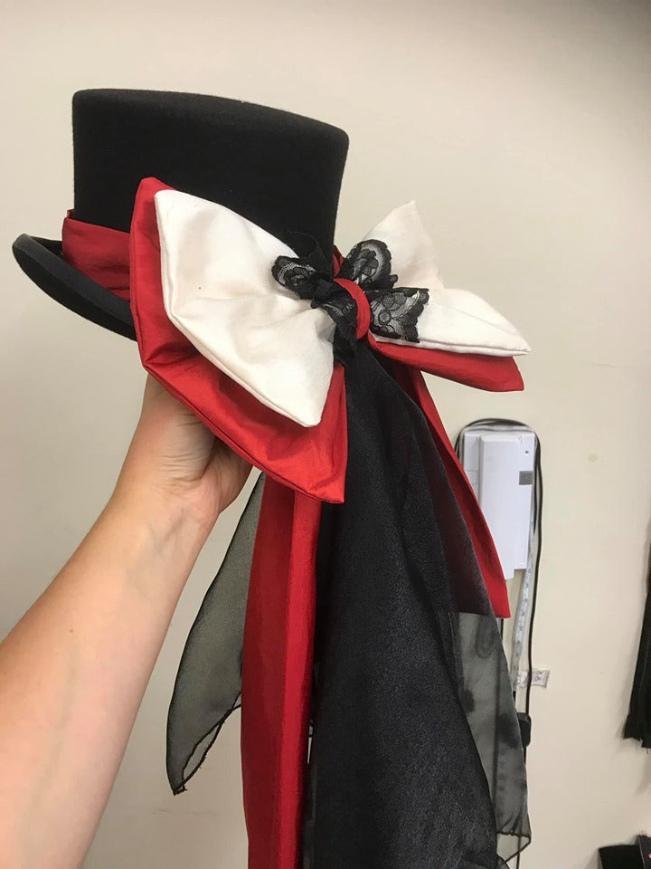Red, ivory and black hat bow